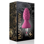 Boîte Raspberry Ass-Berries de Rocks-Off noire à motifs floraux dorés, montrant le plug framboise rose à base en T, mentions de matière, sans scène ni corps.