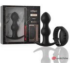 Coffret Anbiguo Tibério : plug anal vibrant a perles en silicone noir et sa telecommande montre Watchme devant l'emballage marbre, jeu anal pilote sans fil.