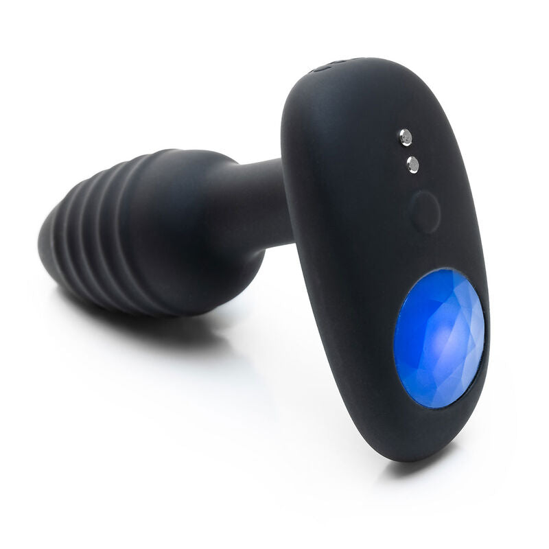 Plug anal Lumen noir nervure en angle avec LED diamant bleue dans la base evasee et boutons, vibration connectee a quatre modes manuels rechargeable etanche Kiiroo.