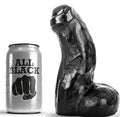 Gode realiste All Black en silicone souple vu pres de sa canette, gland et testicules sculptes aspect vraie chair, modele flexible etanche de 17 cm en solo comme a deux.