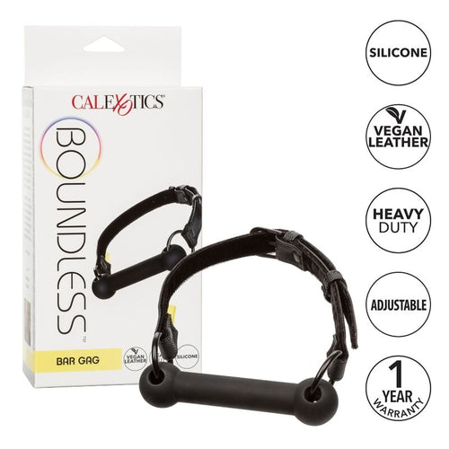 Boîte Boundless Bar Gag CalExotics, bâillon à barre en silicone noir présenté en vitrine, pictogrammes silicone, vegan leather, heavy duty et adjustable.