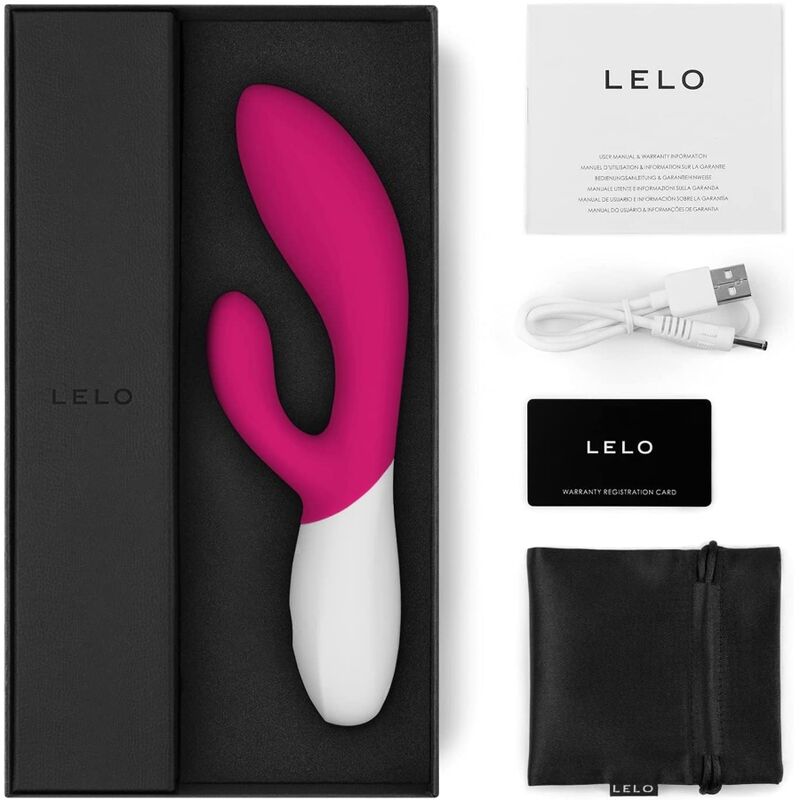 Coffret Lelo Ina Wave 2 fuchsia ouvert avec notice, cable de charge, carte de garantie et pochette noire, rabbit a mouvement de vague point G et bras clitoridien en silicone.