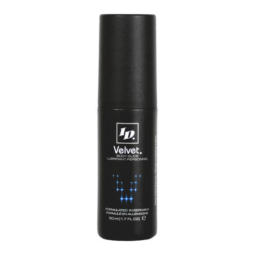 Flacon ID Velvet Body Glide noir trapu 50 ml, lubrifiant silicone soyeux longue duree peaux sensibles, etiquette argentee points bleus de face