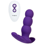 Plug anal vibrant Nalone violet vu en biais : chapelet de billes progressives et base evasee en silicone, vibration et rotation a l'extremite telecommandees.