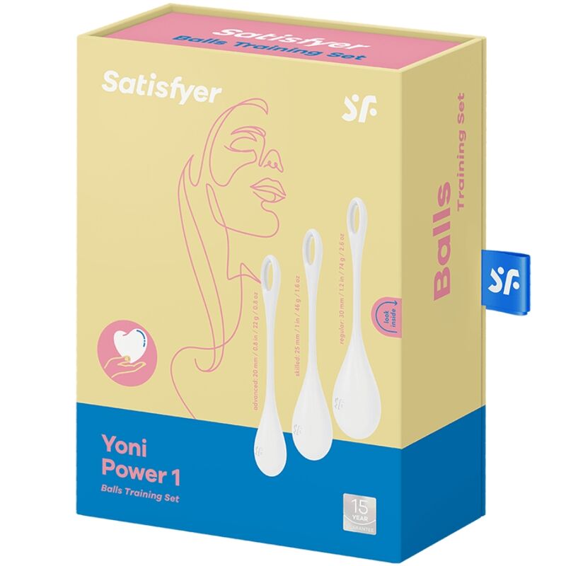 Boite Satisfyer Yoni Power 1 Balls Training Set jaune, dessin de visage au trait et apercu des boules de geisha blanches en silicone.