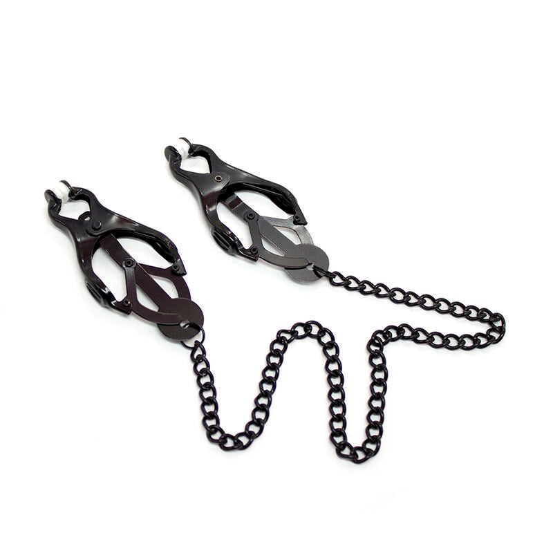 Paire de pinces a tetons clover noires presentees cote a cote avec leur chaine ondulee, embouts proteges, accessoire de domination soft pour stimuler les tetons en douceur.