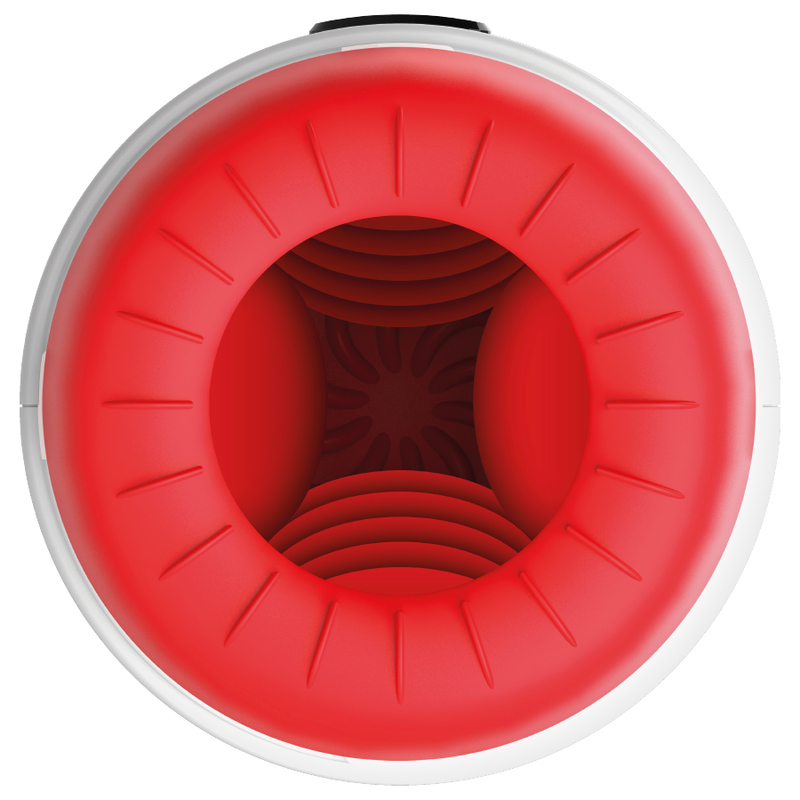 Gros plan sur l'orifice rouge du Rocket Jamyjob au repos, texture interne en spirale