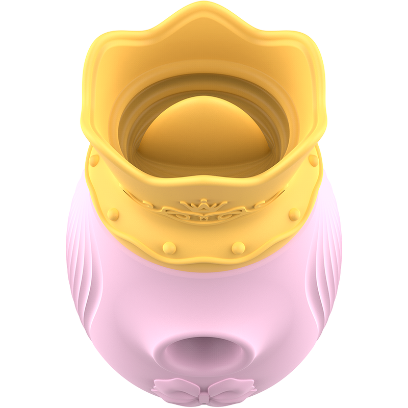 Vue plongeante sur la couronne jaune du stimulateur clitoridien Intense rose, large ouverture creuse en silicone qui enveloppe le clitoris pour la succion