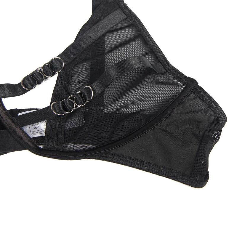 Detail de la culotte Subblime en voile noir a plat, anneaux decoratifs lateraux et couture, etiquette de taille apparente, sans support corps.