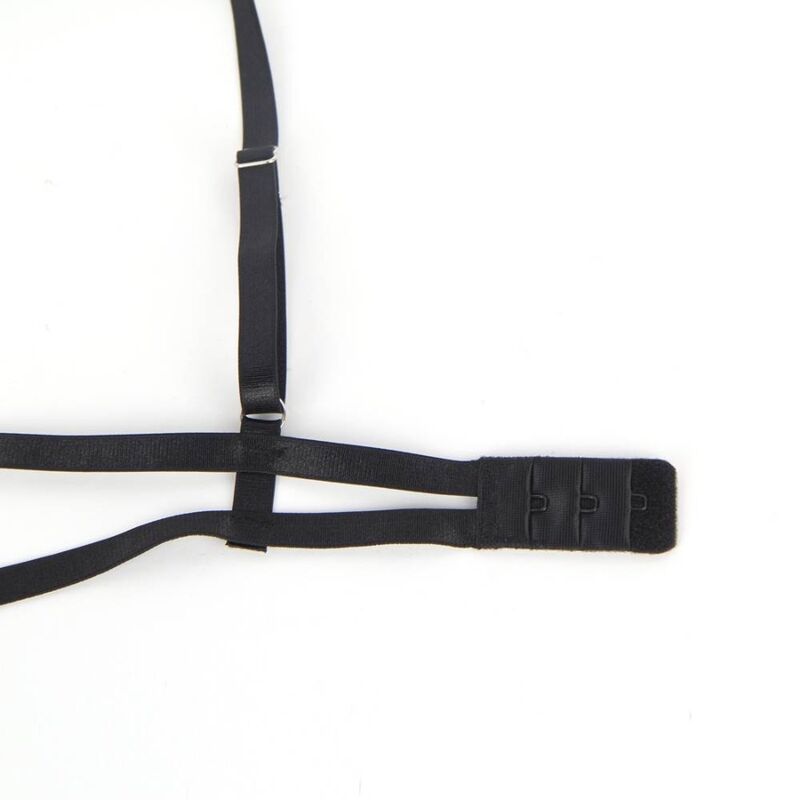 Détail de la boucle réglable et des sangles élastiques du teddy strappy noir Subblime à plat, fermoir métal et bandes fines sur fond clair épuré.