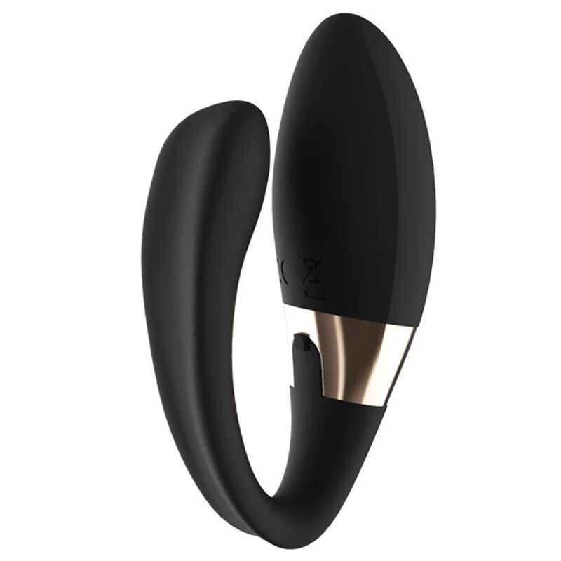 Gros plan du stimulateur de couple Tiani Duo de Lelo noir en forme de U souple, bande dorée centrale, conçu pour être porté discrètement pendant l'amour.