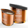 Bougie de massage Senze Seduction girofle orange lavande, verre ambre allume pres de son couvercle noir, cire naturelle au beurre de karite, format 50 ml.