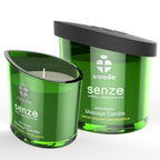 Bougie de massage Senze Arousing citron poivre eucalyptus, verre vert allume a cote de son couvercle noir, cire naturelle se muant en huile de massage.