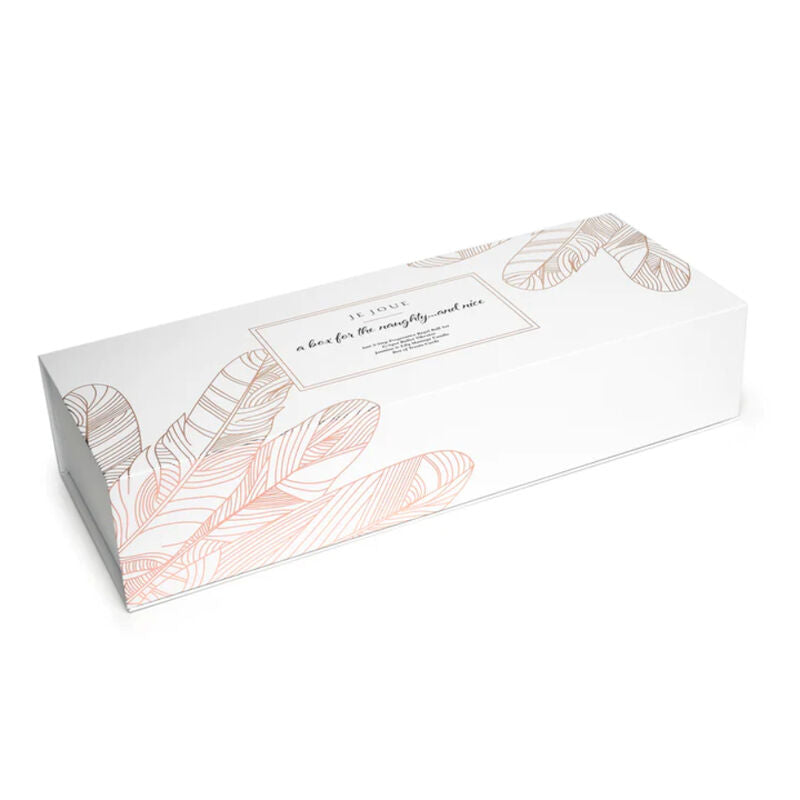 Boîte allongée fermée du coffret bien-être femme Je Joue, couvercle blanc à motif de main et de feuillage cuivré, packaging cadeau élégant posé sur fond blanc.