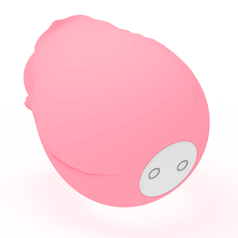 Profil du stimulateur rose en silicone aux courbes arrondies, deux contacts de charge visibles au dos, format compact discret pour stimulation par succion.
