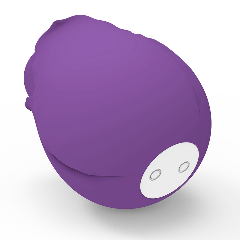 Profil du stimulateur violet en silicone aux courbes arrondies, contacts de charge au dos, format compact discret pour stimulation clitoridienne par succion.