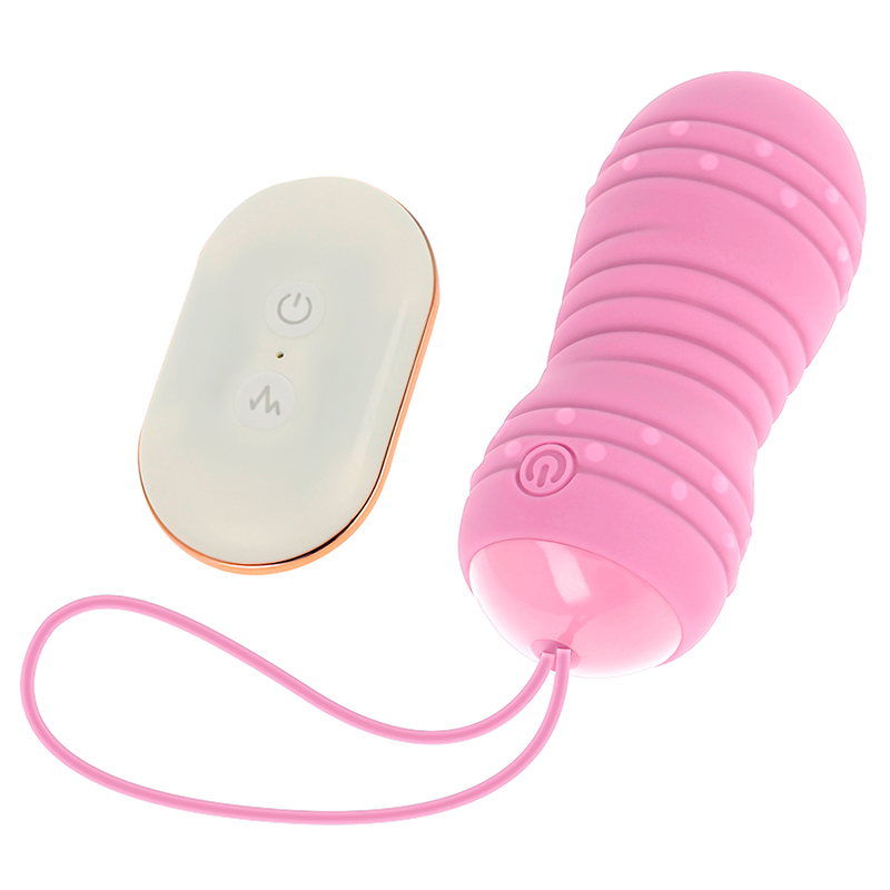 Œuf vibrant rose Ohmama incliné à côté de sa télécommande, reliés par le fil