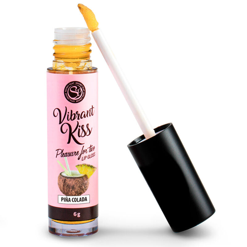 Gloss a levres Vibrant Kiss Secretplay pina colada de profil, flacon rose et noir avec pinceau applicateur, effet vibrant comestible a base de glycerine.