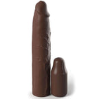 Gaine penienne realiste teinte chocolat Fantasy X-Tensions, surface veinee imitant la peau mate et bonnet d'extension assorti, debout sur fond blanc.