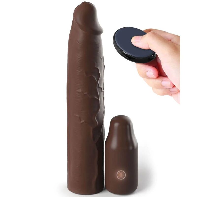 Gaine penienne X-Tensions teinte chocolat tenue avec telecommande, manchon realiste veine et bullet vibrant assorti, extension de 3 pouces a effet rallonge.