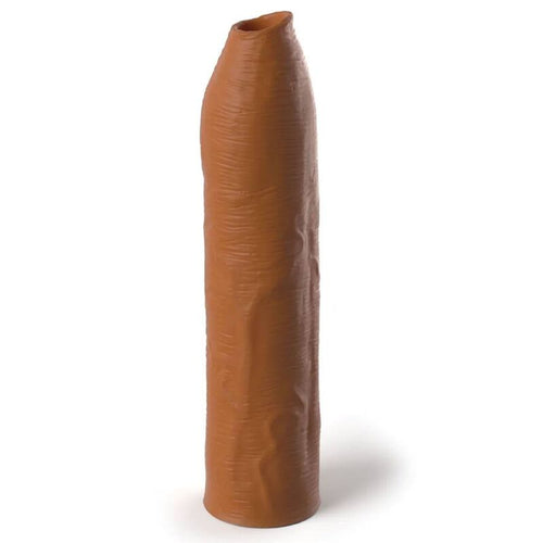 Gaine d extension penienne teinte marron realiste, manchon souple au toucher peau et anneau d entree etroit, pour rallonger le sexe sur peau mate.