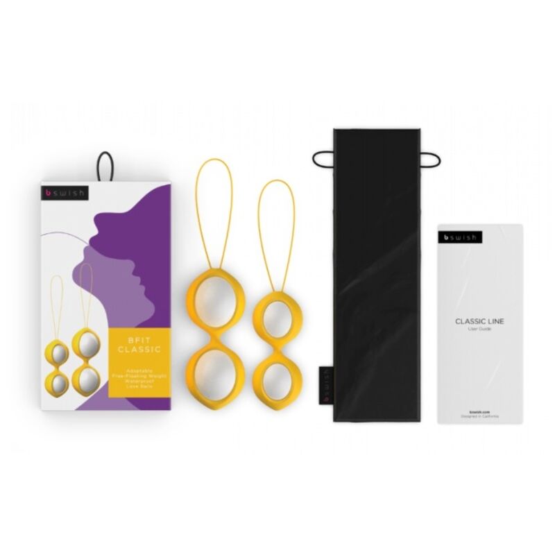 Boîte Bfit Classic violette à gauche, boules de Geisha jaunes à cordon avec harnais et notice noire à droite. Packaging classic line, ensemble d'entraînement pelvien complet.