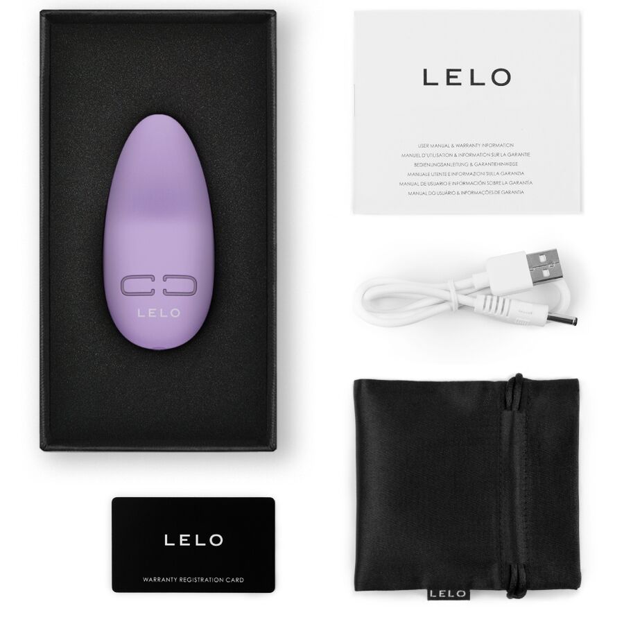 Masseur Lily 3 lavande de Lelo dans son ecrin avec notice, cable USB, carte de garantie et pochette, vibromasseur clitoridien compact en silicone etanche a 10 modes