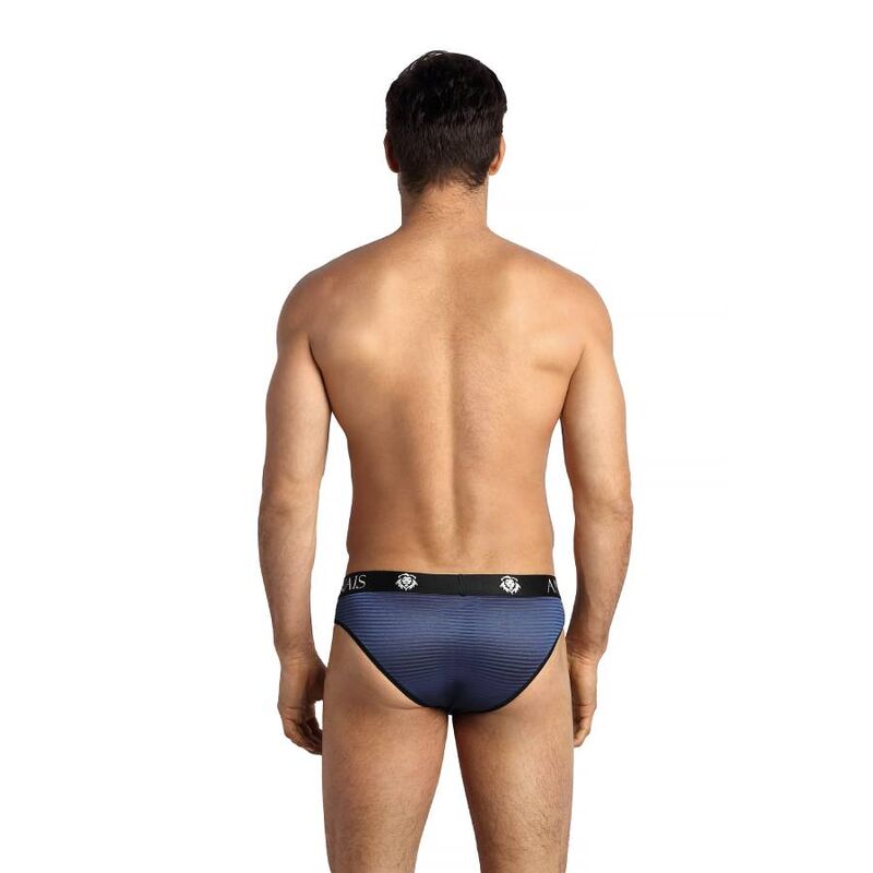 Slip homme Naval bleu marine vu de dos sur mannequin torse nu, coupe sportive ajustee en tulle a rayures satinees, large ceinture elastique signee Anais.