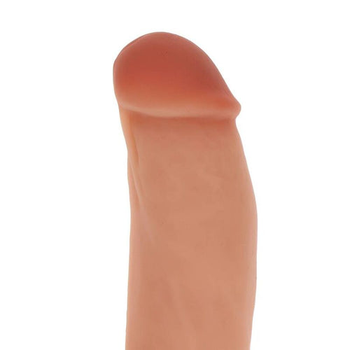 Gros plan sur le gland et la tige veinee du gode realiste Get Real en silicone couleur chair, surface lisse non poreuse mettant en valeur le modele naturel.
