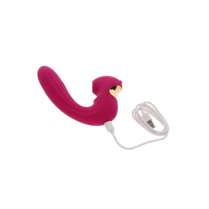 Stimulateur Celestial Love fuchsia avec cable de recharge USB branche, embout clitoridien dore visible, sextoy double stimulation silicone rechargeable.