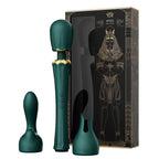 Coffret Kyro vert et doré à motifs égyptiens avec le wand et ses embouts disposés autour de la boîte, accessoires lisses non anatomiques élégants. Marque Zalo, baguette Kyro luxe.