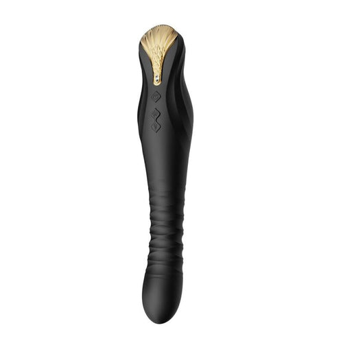 Le King noir de face, tête arrondie et corps strié en spirale, écusson doré sommital, témoins de commande, stimulateur à poussée télescopique en silicone.