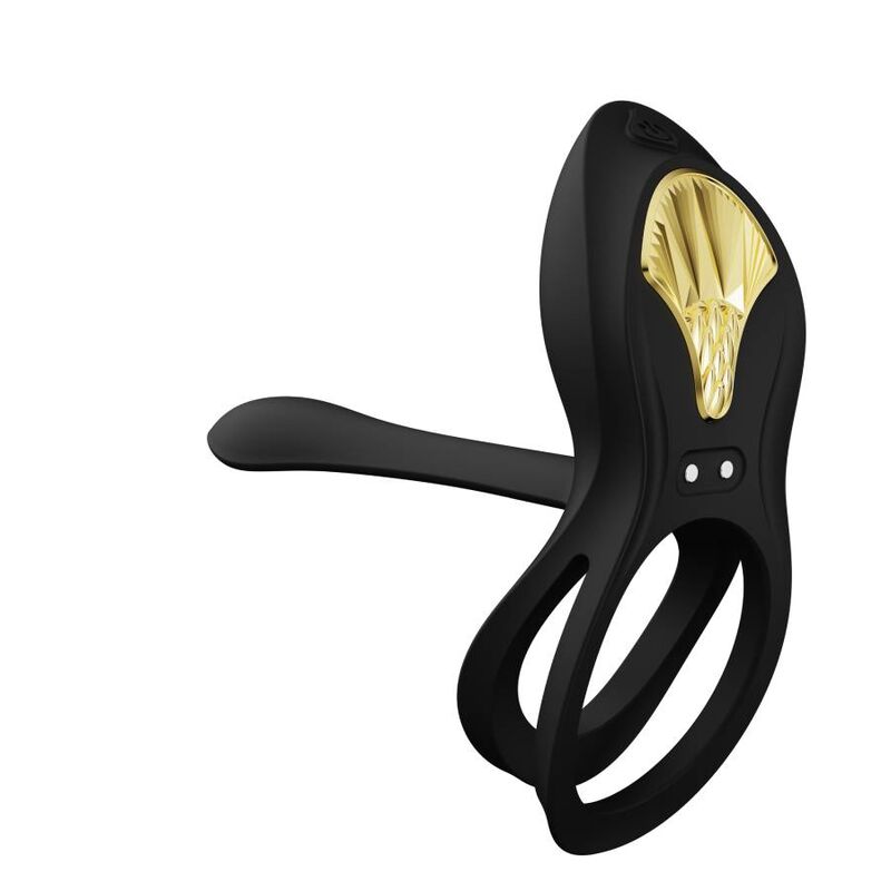 Le cockring Bayek noir vu de côté, double anneau et long bras extensible incurvé, plastron doré en éventail, accessoire de couple épuré sans relief. Marque Zalo, cockring Bayek de couple.