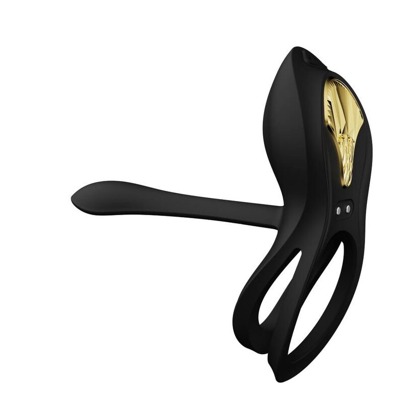 Anneau vibrant Bayek noir en diagonale, double boucle souple et bras extensible, écusson doré, silicone mat, accessoire de couple discret et lisse. Marque Zalo, cockring Bayek de couple.