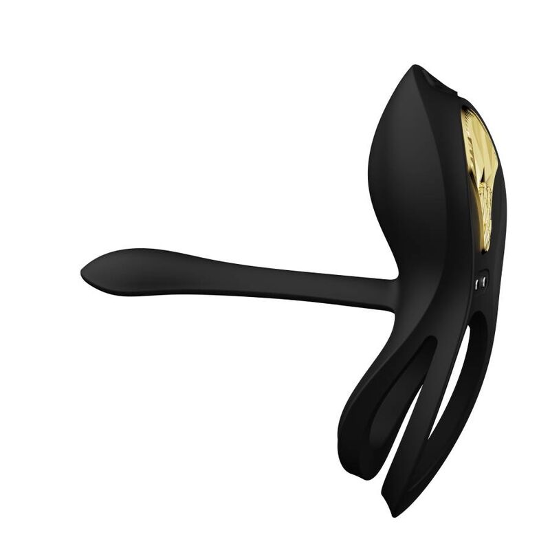 Anneau Bayek noir vu de dos, bras extensible déployé sur le côté et double boucle, dos lisse de l'écusson, accessoire de couple sans détail réaliste. Marque Zalo, cockring Bayek de couple.