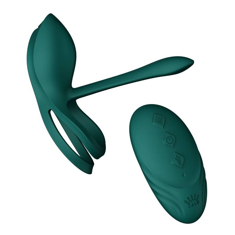 Anneau Bayek vert à double boucle et bras extensible posé près de sa télécommande galet verte, ensemble de couple en silicone lisse, sans anatomie. Marque Zalo, cockring Bayek de couple.