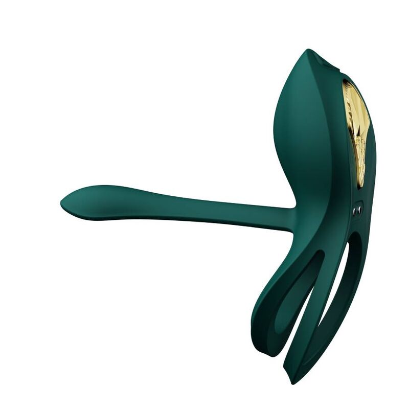 Anneau Bayek vert vu de côté, double boucle et bras extensible incurvé tendu, écusson doré central, accessoire de couple en silicone souple, sans anatomie.