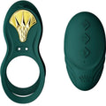Anneau Bayek vert à plastron doré accompagné de sa télécommande galet verte, accessoire de couple en silicone laqué lisse, présentation duo, sans relief.