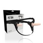 Harnais gode Fetish Submissive avec gode chair realiste en silicone et sa boite, sangles noires ajustables, ensemble strap-on pour la stimulation partagee.