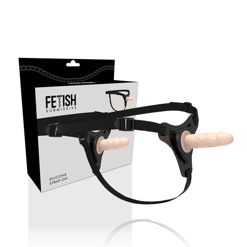 Harnais gode Fetish Submissive avec gode chair realiste en silicone et sa boite, sangles noires ajustables, ensemble strap-on pour la stimulation partagee.