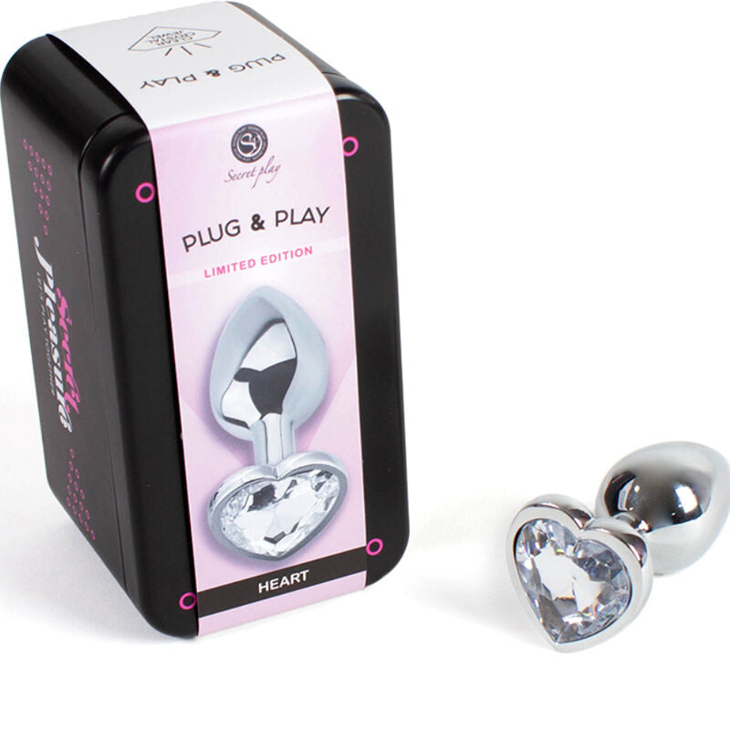 Coffret Plug and Play Heart avec plug metal a coeur strass cristal, boite illustree noire, kit cadeau pour decouvrir le plug bijou Secret Pleasure.