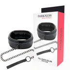 Boite Darkness Full Black Collar with Leash montrant le collier cuir rembourre et sa laisse chaine noire, packaging blanc et rouge pour domination
