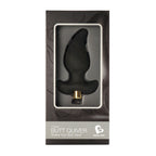 Boîte Butt Quiver de Rocks-Off, fenêtre dévoilant le plug anal profilé en silicone noir avec sa balle vibrante dorée, sur emballage noir épuré, sans corps représenté.