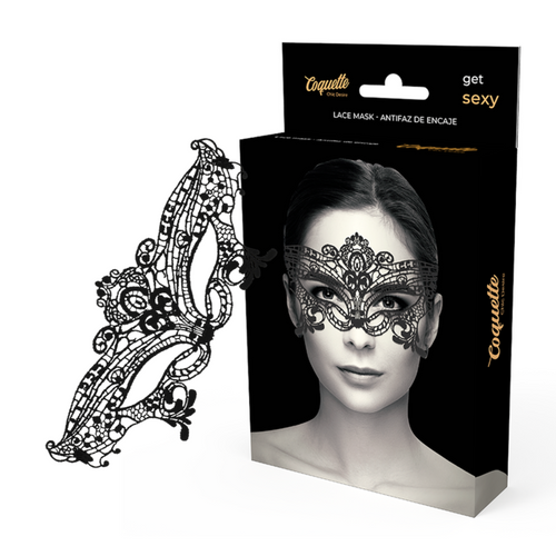 Masque en dentelle noire Coquette Chic Desire pose a plat a cote de sa boite illustree d'un visage, accessoire fetiche semi-transparent qui reduit la vue pour eveiller les sens.