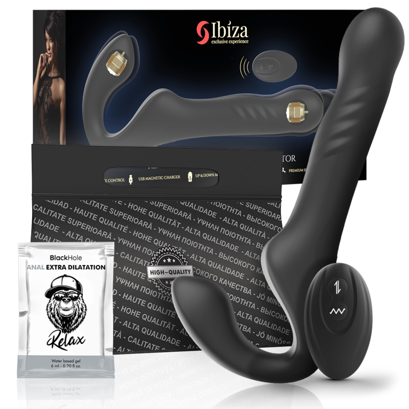 Harnais vibrant télécommandé Ibiza noir, base incurvée insérable à anneaux dorés et tige externe striée, avec télécommande noire et sachet de gel BlackHole Anal Extra Dilatation.