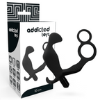 Boite Addicted Toys 10 cm avec le plug anal vibrant a double anneau penien en silicone noir, accessoire masculin combine plug et bagues.