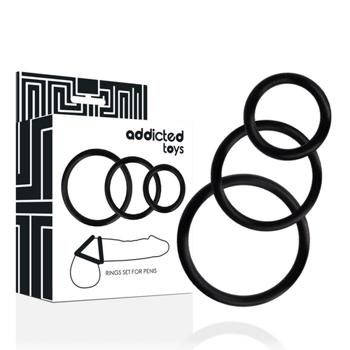 Trois anneaux péniens noirs Addicted Toys séparés, alignés près de leur boîte Rings Set for Penis.