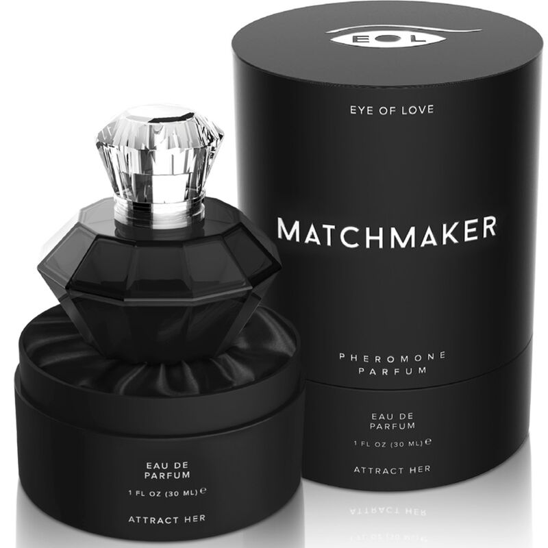 Eau de parfum aux phéromones Matchmaker Black Diamond, flacon diamant noir a bouchon cristal pose sur sa boite ronde noire Attract Her, accord boisé fruite Eye Of Love.