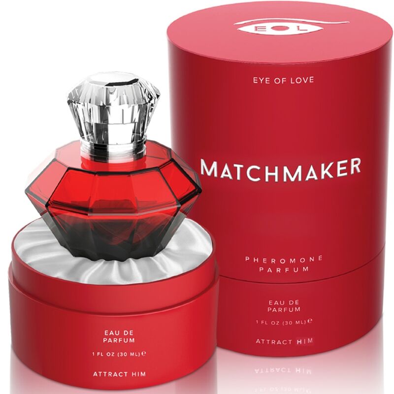 Eau de parfum aux phéromones Matchmaker Red Diamond, flacon diamant rouge a bouchon cristal pose sur sa boite ronde rouge, fragrance jasmin pamplemousse ambre Eye Of Love.