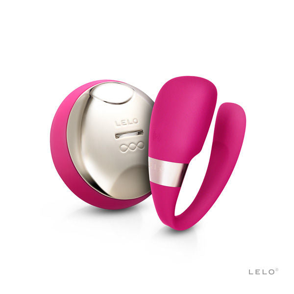 Stimulateur de couple Lelo Tiani 3 rose en U avec telecommande ronde doree, masseur a porter en silicone pilotable a distance sans anatomie.